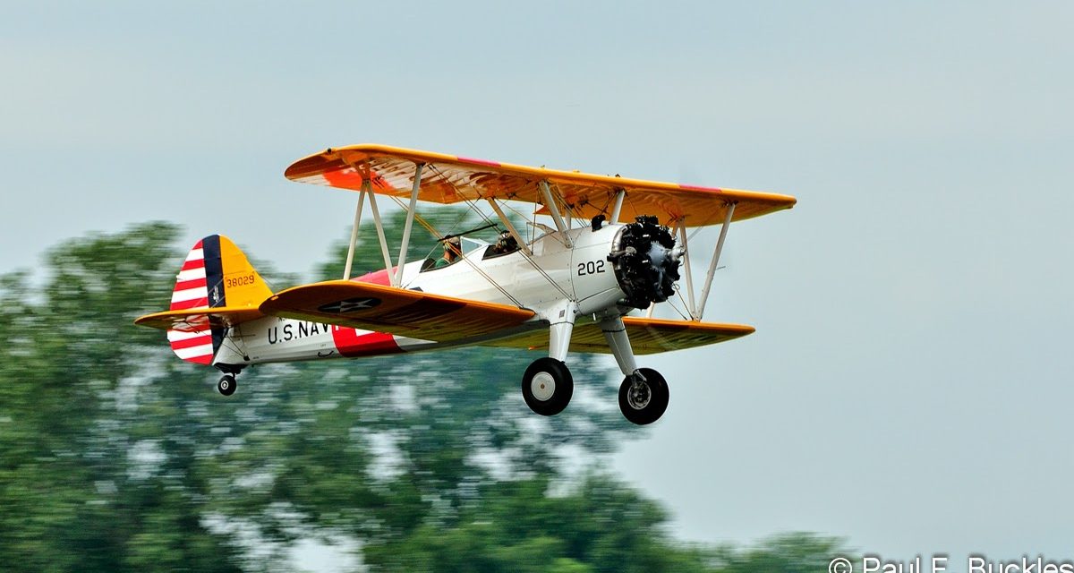 Here’s a Boeing PT-17 Stearman taking off from the Mid East Regional Fly-In at Grimes Field Urbana, Ohio August 2014.