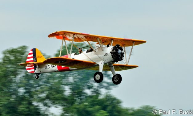 Here’s a Boeing PT-17 Stearman taking off from the Mid East Regional Fly-In at Grimes Field Urbana, Ohio August 2014.