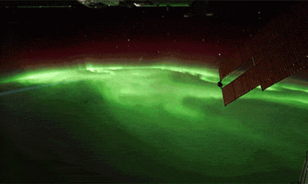 International Space Station flying over the Northern Lights