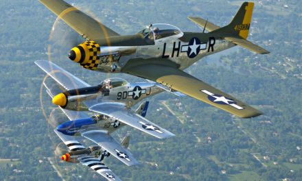 A formation of four P-51D Mustangs flying at the Thunder over Michigan 2012 airshow on August 3, 2012.