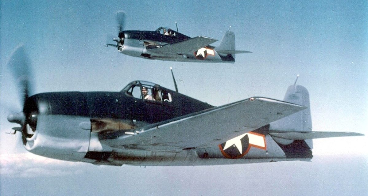 Grumman F6F-3 Hellcats in tricolor camouflage.