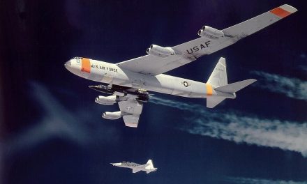 X-15 being carried by its NB-52B mothership (52-0008), with T-38A chase plane.
