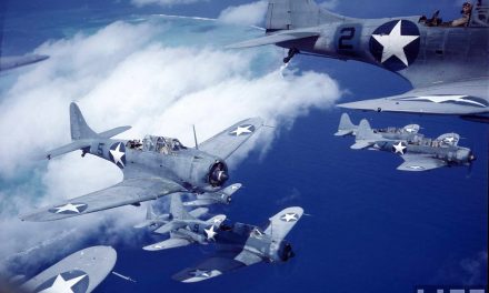 A squadron of SBD Dauntless dive bombers over the Pacific.
