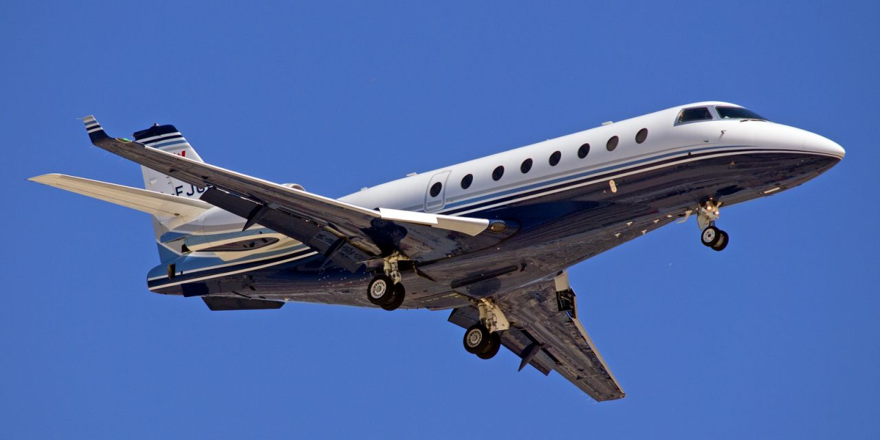 A Gulfstream G200 business jet swooping in for a landing at CYWG / Winnipeg.