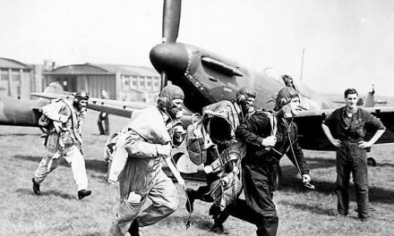 Pilots of 19 Squadron scramble in front of the press at Duxford, March 1939.