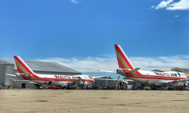 Two B747-400 freighters sit across the ramp, getting their A-checks worked.