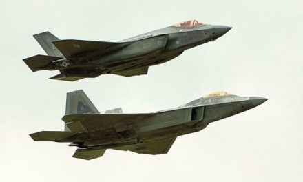 Two generations of stealth fighters- an F-22 Raptor (furthest from the camera) in formation with an F-35 Lightning…