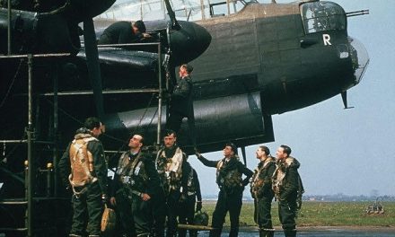 Following a test flight, the skipper of a Lancaster BI discusses an issue with the starboard inner Merlin engine, as…