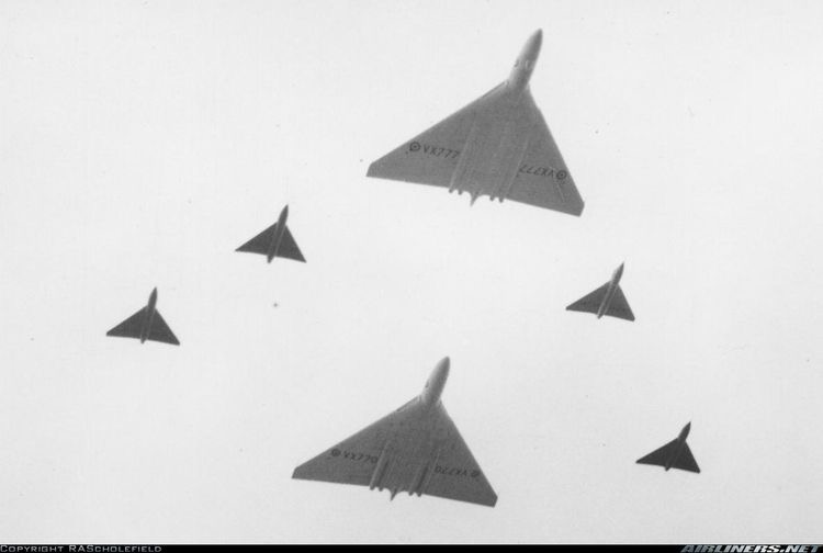 A formation of the two Avro Vulcan prototypes and the scaled-down wing test beds in formation over Farnborough in…