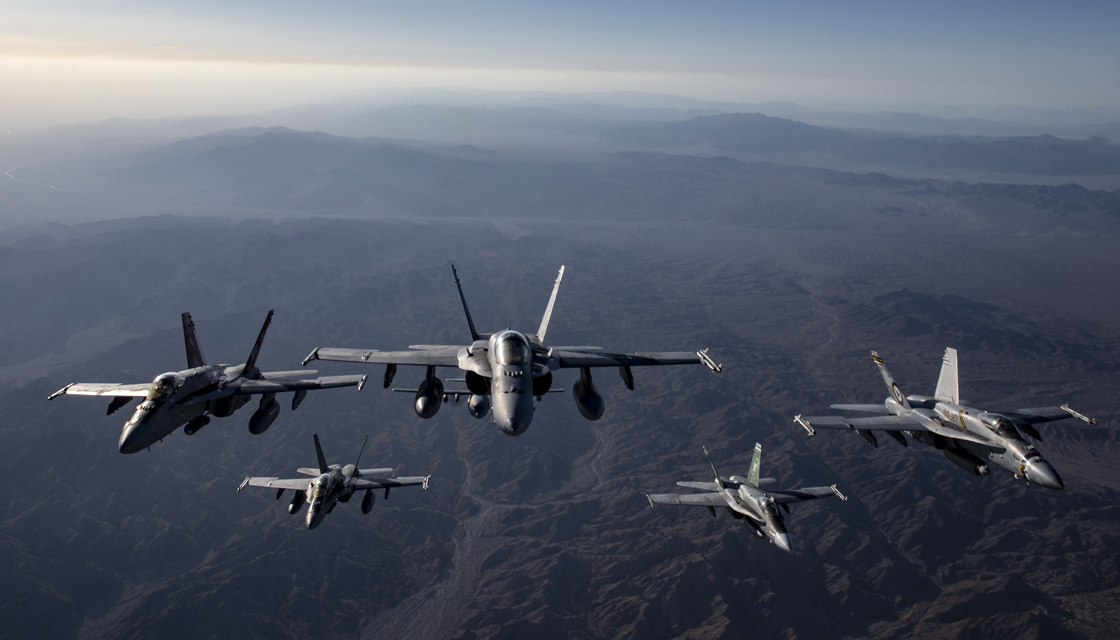 A swarm of USMC Hornets, Boeing F/A-18 Hornets flying along the  Pacific Coast of Southern California—U.S.