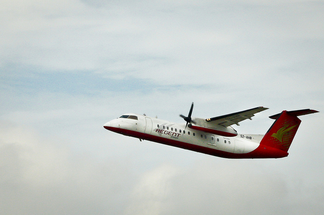 Regent Airways Bombardier Dash 8-Q311 S2-AHB takes off using Runway 14.