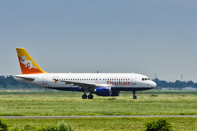 Druk Air – Royal Bhutan Airlines Airbus A319-115 A5-RGG at the taxiway after landing